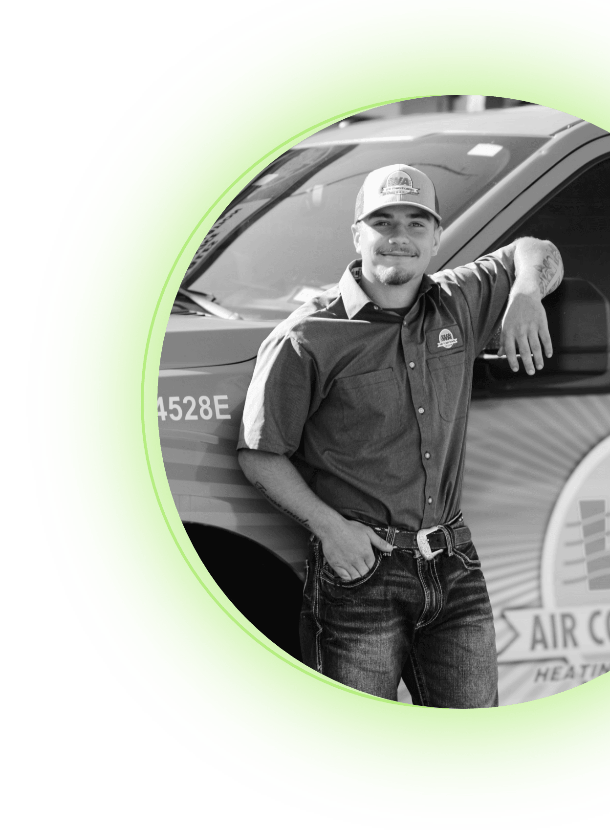 W A Air Conditioning employee; Remi, standing against his service vehicle at Trinity office.