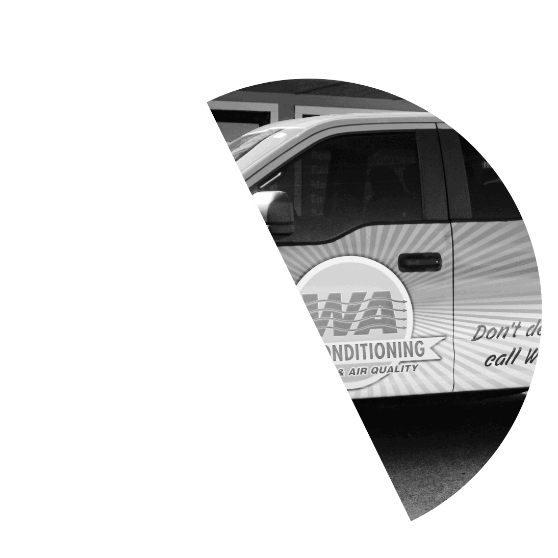 W A Air Conditioning service vehicle in front of Trinity, TX, office.